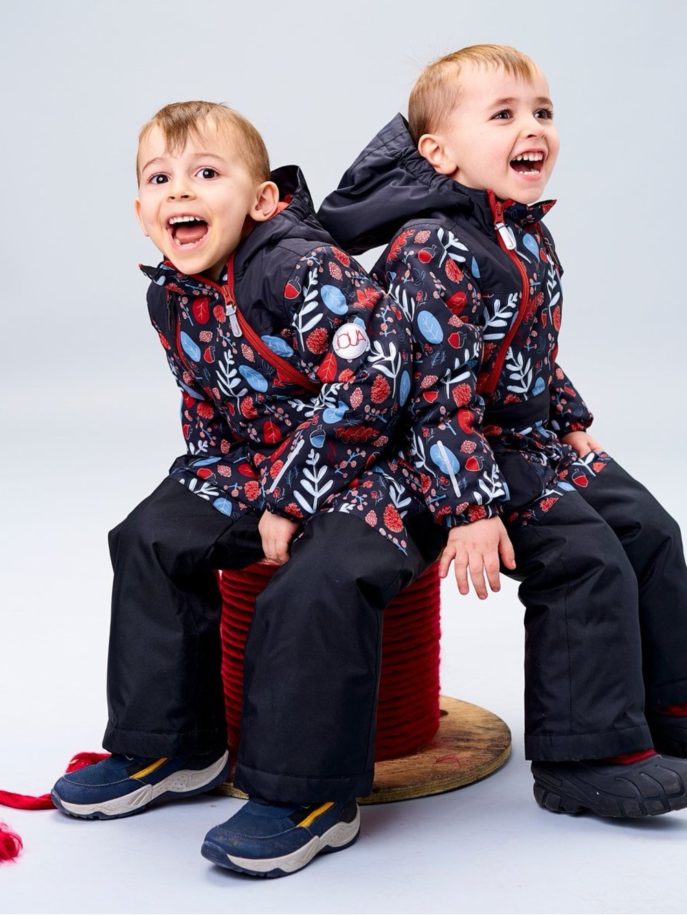 Kids one piece Winter Jacket with Red Accents can go to girls or boys